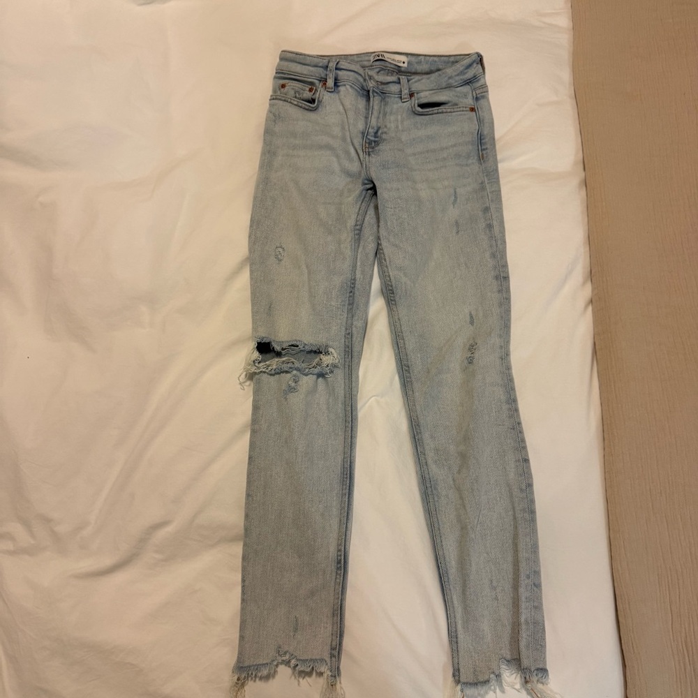 Distressed Light Blue Jeans